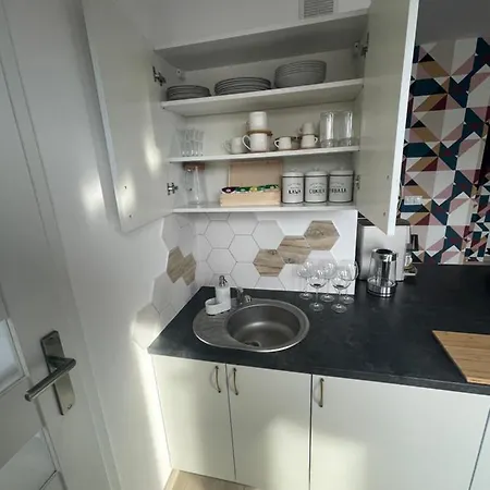 White Frog Apartment *